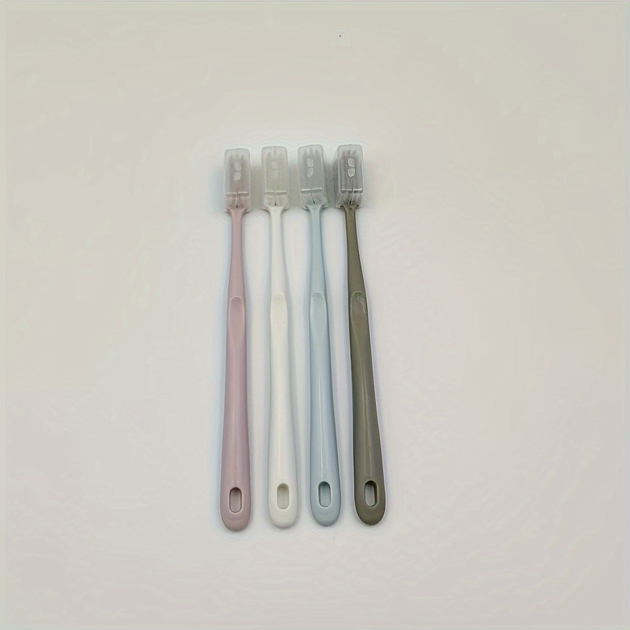 Set of 4 Soft-Bristled Toothbrushes in Japanese Macaron Colors, Complete with Protective Cases - Ideal for Portable And Professional Dental Hygiene for Adults.